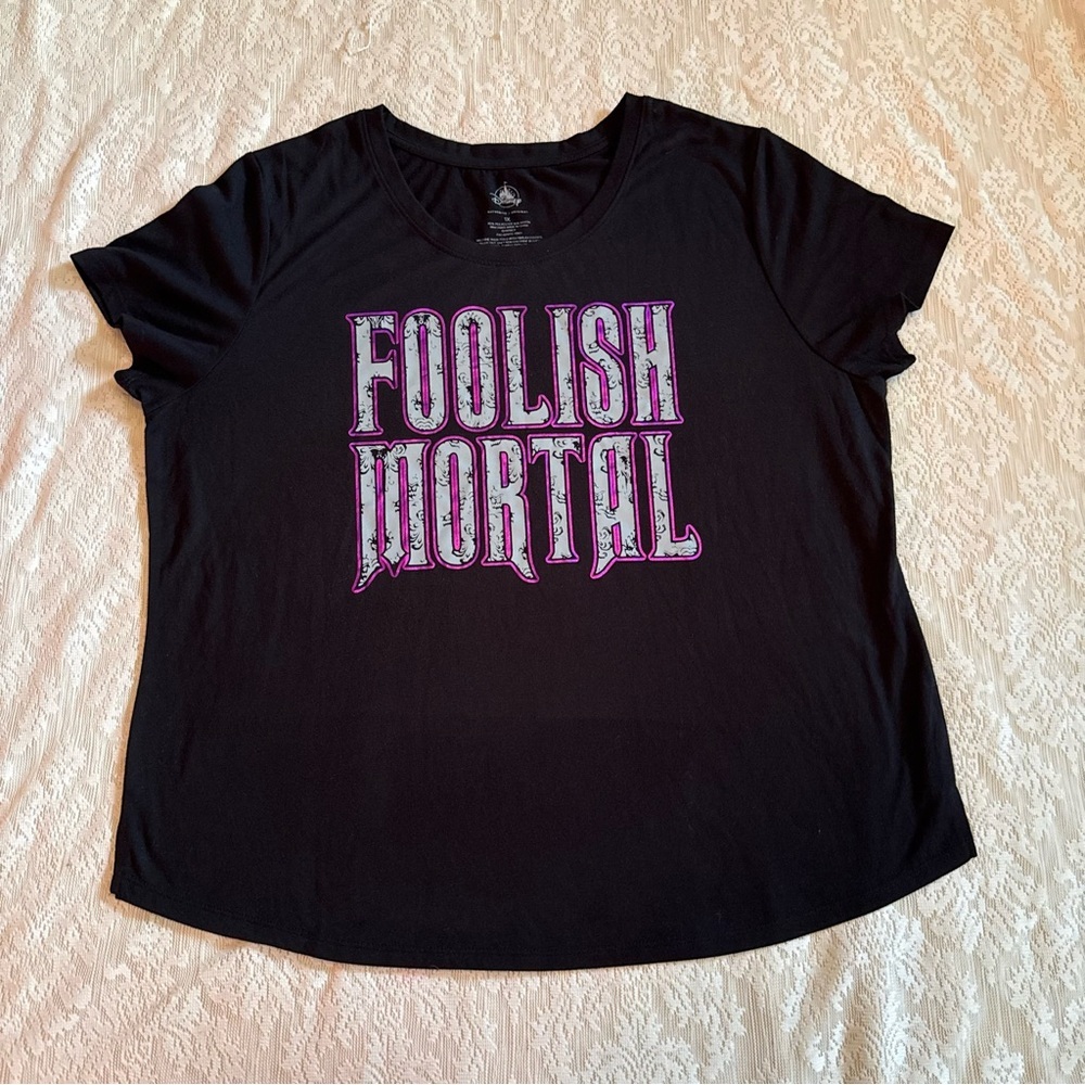 Disney Parks Haunted mansion “Foolish Mortals” graphic metallic tee